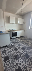 Photo de galerie - Pose de revêtement de sol, pose d'une petite cuisine 
