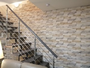 Photo de galerie - Pose de pierres de parement sur un mur de montée d'escalier !