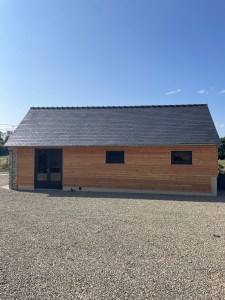 Photo de galerie - Réalisation de l’ossature avec pose d’un bardage 