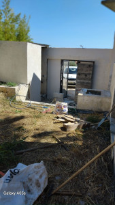 Photo de galerie - Pose de porte  creation d un lical technique et enduit pareîl