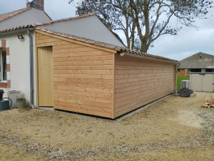 Photo de galerie - Création d'une ITE avec un revêtement en douglas 