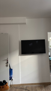 Photo de galerie - Fixation support TV + pose TV 