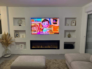 Photo de galerie - Meuble TV en placo, case et cheminée intégrés ! 
