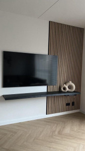 Photo de galerie - Pose de tasseaux avec pose de télé et meuble 