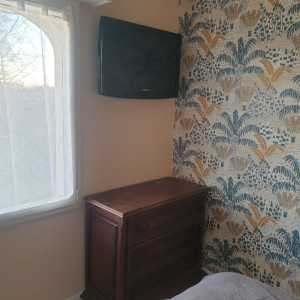 Photo de galerie - Installation tv au mur + passage câble dans la cloison. 