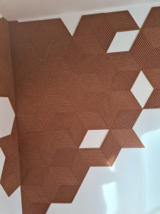 Photo de galerie - Pose Liège du décoration haut gamme au mur du bureau d'architecte