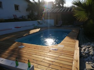 Photo de galerie - Aménagement extérieur et création d'un mur de soutènement  une piscine avec ça terrasse et son poulaous