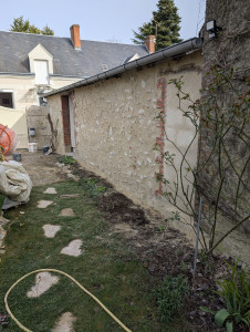 Photo de galerie - Enduit a la chaux pierre apparente mur après 