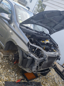 Photo de galerie - Remplacement radiateur, optique de phares, disques et plaquettes avant sur Chevrolet Aveo, pour contre-visite de contrôle technique. 