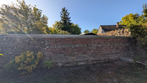 Photo de galerie - Restauration mur mitoyen en briques 