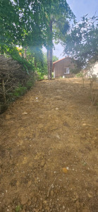 Photo de galerie - Terrassement et nivellement en pente naturelle après décaissement d'une piscine. 