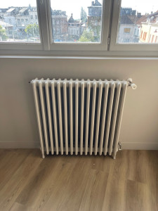 Photo de galerie - Pose radiateur fonte 