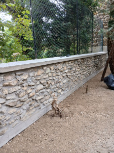 Photo de galerie - Démolition complète ancien mur et construction d' un nouveau mur en pierre 