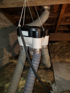 Photo de galerie - Remplacement d'une VMC dans un grenier et création d'un nouveau conduit d'extraction.