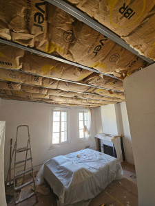 Photo de galerie - Ossature et isolation plafond en 30 cm de laine de verre