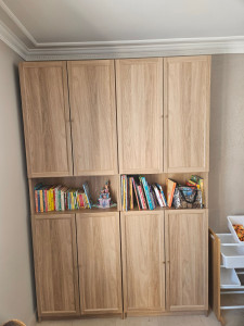 Photo de galerie - Montage bibliothèque ikea 
après 