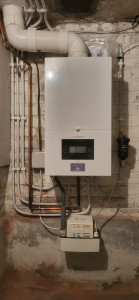 Photo de galerie - Installation d'une chaudière mixte gaz a condensation avec chauffage central complet. 