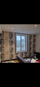 Photo de galerie - Pose de tapisserie.