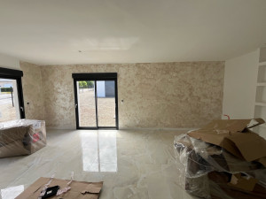 Photo de galerie - Application d’une peinture a matière 