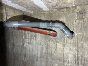 Photo de galerie - Raccordement Évacuation PVC sur réseau existant fonte
