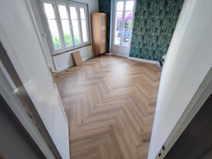 Photo de galerie - Réalisation d'un parquet en bâton rompu 