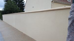 Photo de galerie - Mur en parpaing avec crépis 