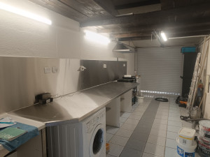 Photo de galerie - Création d'une cuisine industrielle aux normes HACCP dans un garage.