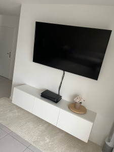 Photo de galerie - Montage et fixation du meuble tv et fixation de la tv au mur. 