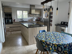 Photo de galerie - Optimisation et aménagement d’une cuisine avec îlot