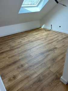 Photo de galerie - Pose du sous-couche du parquet, pose de parquet stratifié.