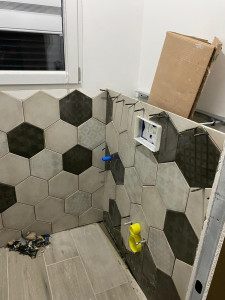 Photo de galerie - Pose toilette suspendu plus carrelage 