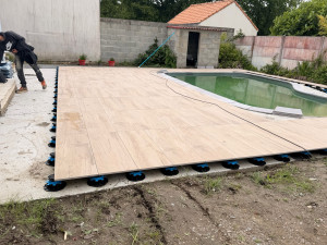 Photo de galerie - Pose d’une terrasse sur plot 
