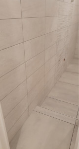 Photo de galerie - Pose de carrelage sol et mur dans une salle de bain 