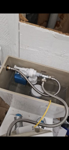 Photo de galerie - Mise en place d’un WC avec lave-mains intégré au cabinet dentaire.