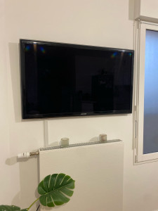 Photo de galerie - Fixation Tv au mur 