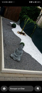 Photo de galerie - Aménagement d'un coin zen dans le jardin 
