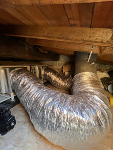 Photo de galerie - Installation de 2 mono Split Heiwa avec extraction d’air avec sorti de toiture 