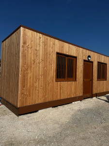 Photo de galerie - Pose d'un bardage douglas avec isolation extérieure 