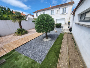 Photo de galerie - Taille d'arbres et arrachage des mauvaises herbes