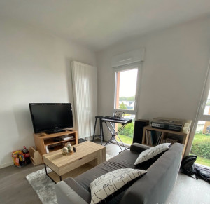 Photo de galerie - Un salon avec tous ses meubles