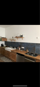 Photo de galerie - Démontage et remontage d’une cuisine, réfection de celle-ci avec changement du plan de travail et customisation des portes de cuisine.