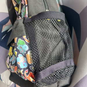 Photo de galerie - Ajout d'une poche de gourde sur sac à dos. 