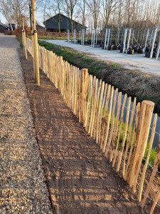 Photo de galerie - Création d’une clôture en piquets bois 