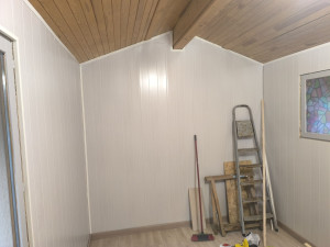 Photo de galerie - Pose de parquet, ainsi que de lambris PVC au mur 