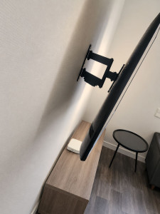 Photo de galerie - Installation de support TV mural 