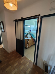 Photo de galerie - Pose d'une porte coulissante 