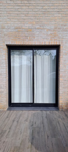 Photo de galerie - Nettoyage pvc d'une baie vitrée et son vitrage 