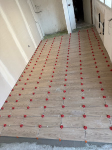 Photo de galerie - Pose carrelage imitation parquet  