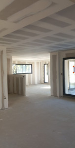 Photo de galerie - Chantier de traitement  de bandes à joint ,maisons de 140 m2 