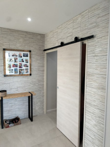 Photo de galerie - Pose de la porte coulissante 